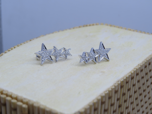 Buy 0.10 Carat (ctw) Round Diamond Ladies Star Shape Climber Stud