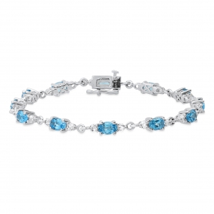 6X4 mm Oval Blue Topaz & 2.3 mm Round White Topaz Ladies Three Stone Bracelet Sterling Silver
