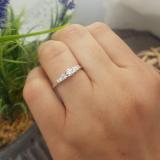 0.45 Carat (ctw) 14K White Gold Round & Baguette Cut Diamond Ladies 3 Stone Engagement Bridal Ring