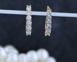 0.85 Carat (ctw) 14K Yellow Gold Round Cut White Diamond Ladies Huggies Hoop Earrings